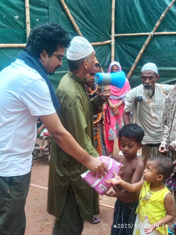 Volunteer helping children with food
