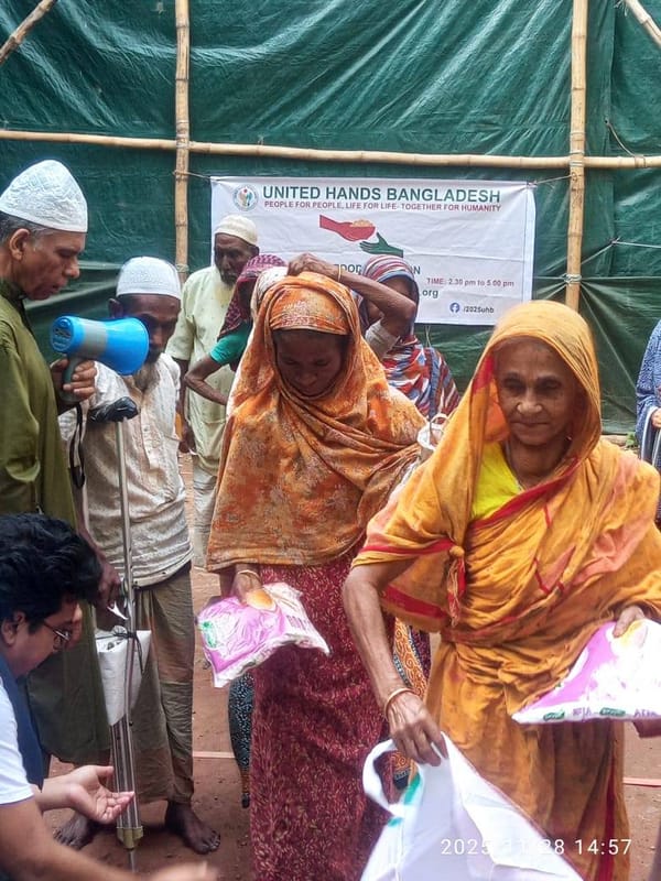 Women receiving essential supplies